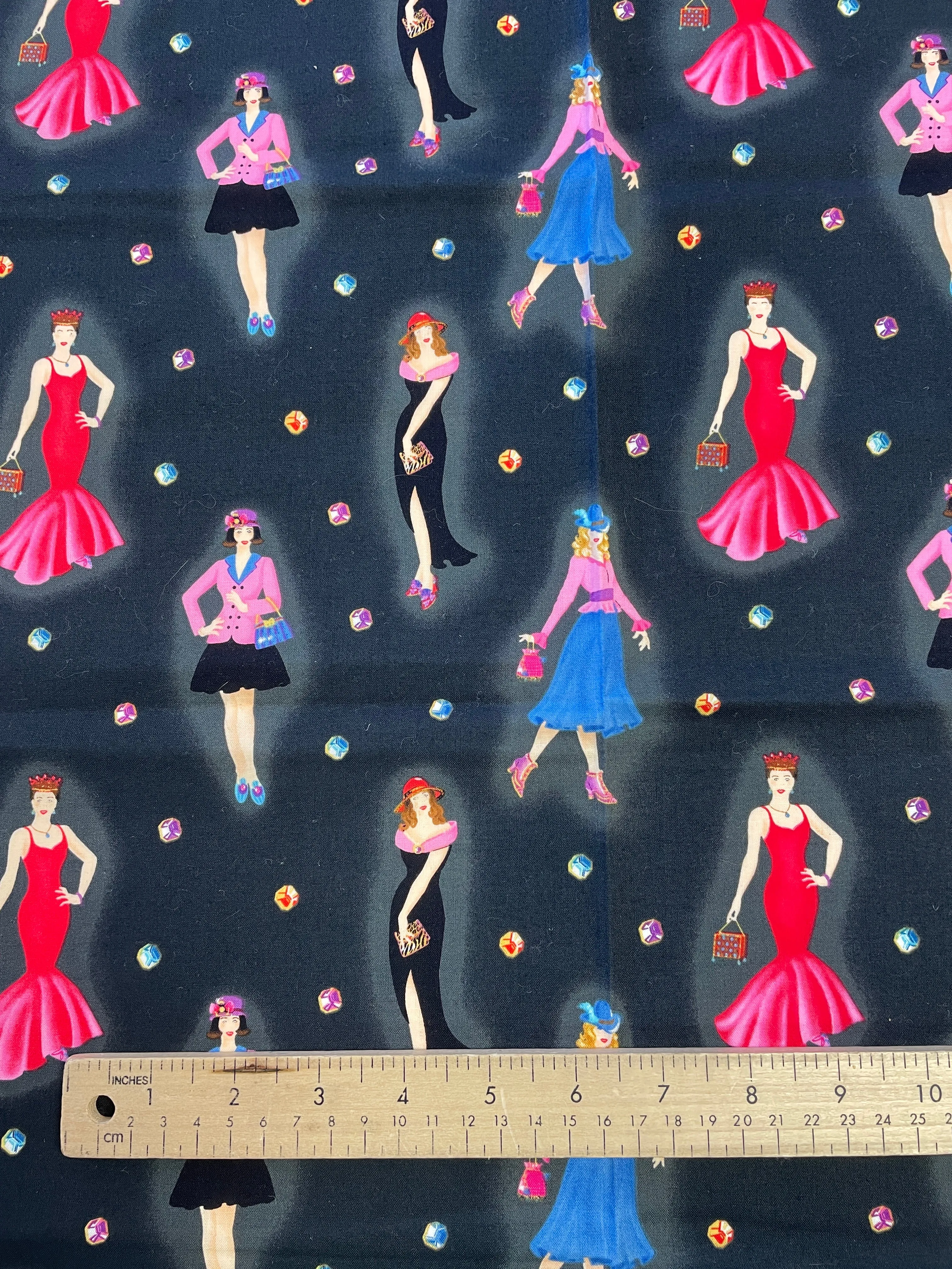 1 3/8 YD Quilting Cotton - Black with Women in Multicolored Outfits